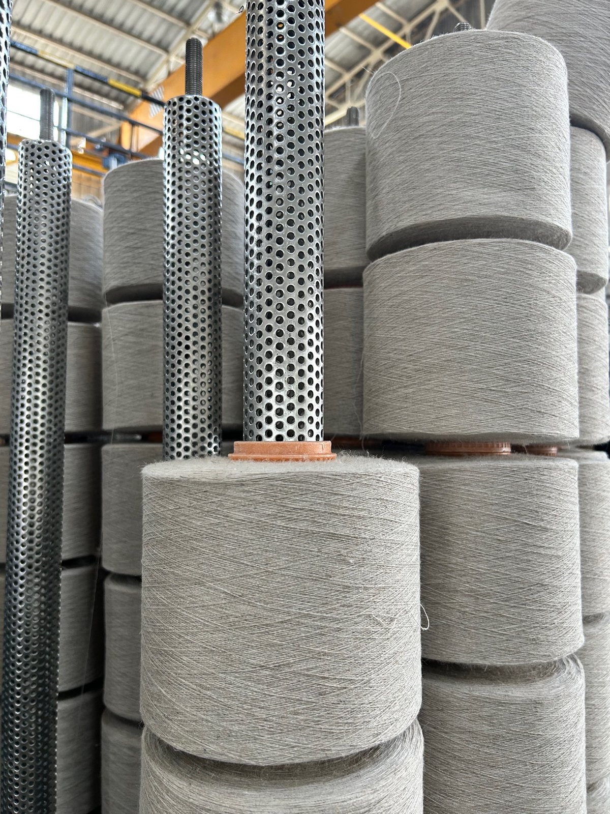 Yarn cones stacked in the store